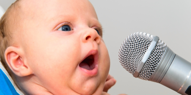Baby Singing Sessions with a baby sining into microphone